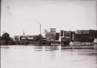 view over river with buildings in distance